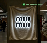 Miumiu Throw Blankets